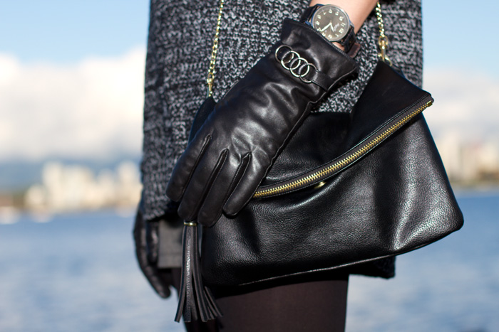 Vancouver Fashion Blogger, Alison Hutchinson, wearing XO Bella oversized grey maxi sweater, grey bodycon mini skirt from Urban Outfitters. Anne Klein black biker boots, H&M opal statement necklace, H&M black leather bag, Danier Black leather gloves, Versace sunglasses, and Kenneth Cole watch