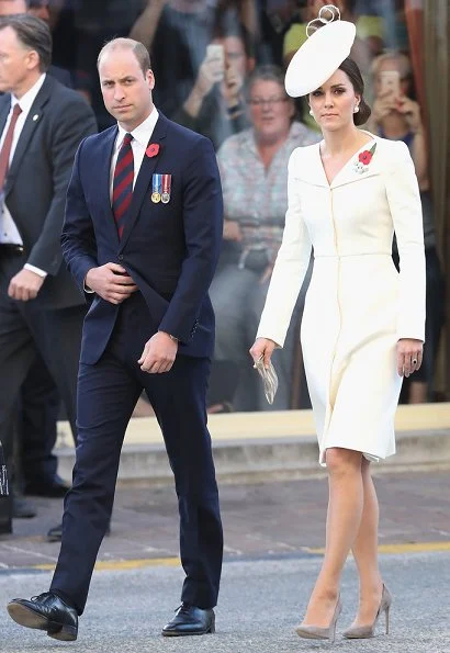 Kate Middleton wore Alexander McQueen cream coatdress. Anne Grand-Clement clutch, Balenciaga pearl earrings. Mathilde Natan lace dress