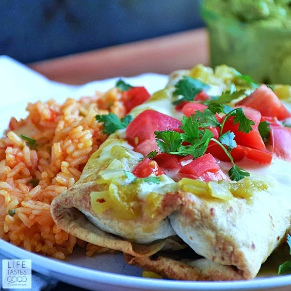 If you need an easy dinner recipe that tastes AH-mazing, you've landed on the right page! Easy Baked Chicken Chimichangas | by Life Tastes Good are better than restaurant quality (imho) and made easy with a delicious short cut. I'm so excited to share my super secret shortcut recipe with you!