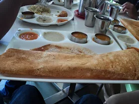 The four riders taking a break on the highway