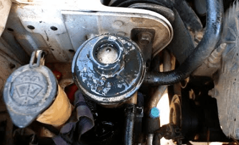 What causes foaming of power steering fluid?
