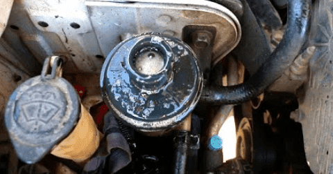 What causes foaming of power steering fluid?