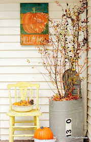 use fall branches and garage sale finds to decorate for fall
