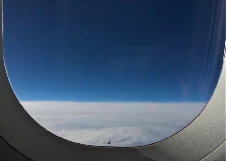 Why is there a tiny hole in airplane windows? Information In