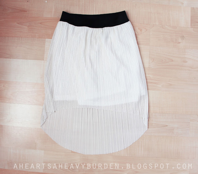 My mom picked out this high-low skirt for me. I like the color (white ...