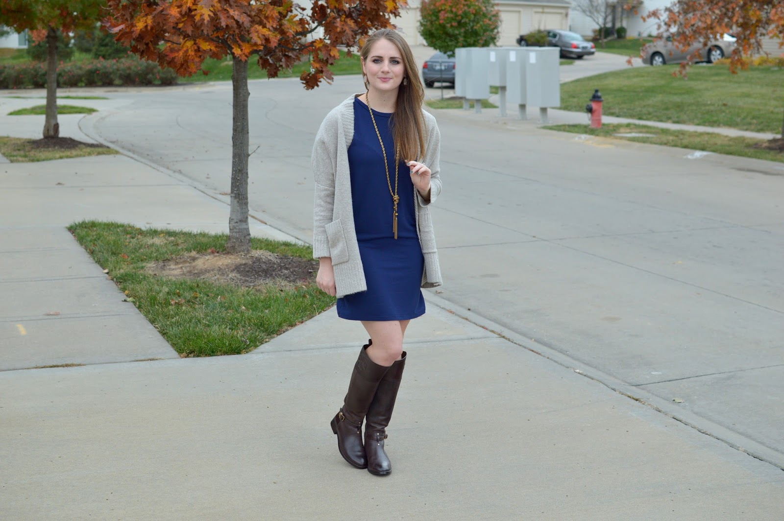 navy t-shirt dress with a cozy sweater
