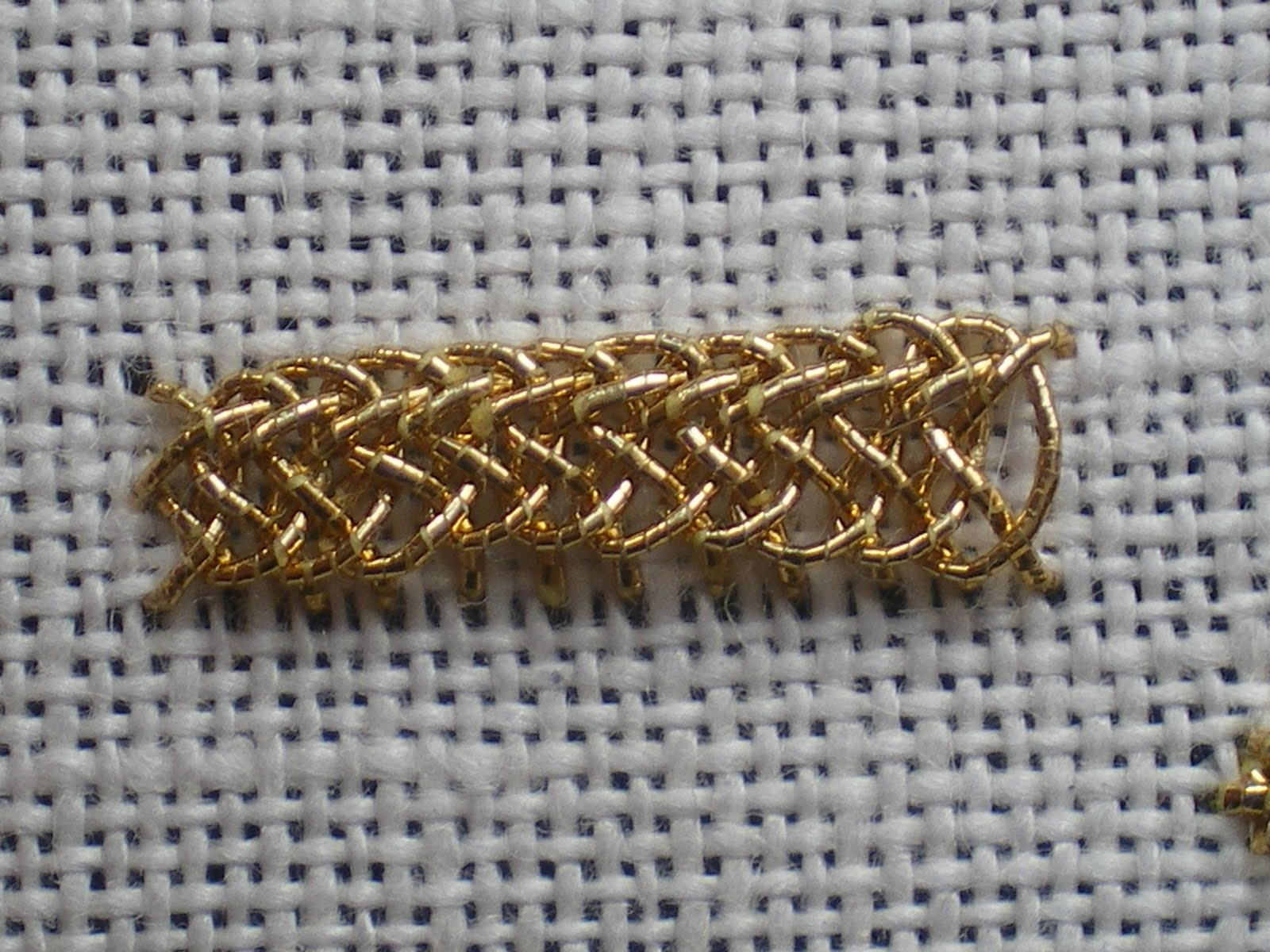 Threads Across the  Plaited Braid Stitch