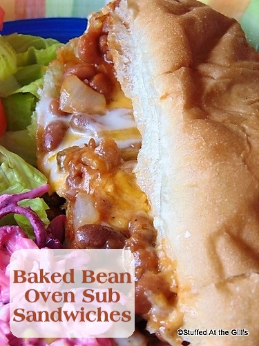 Baked Bean Oven Sub Sandwich served with Pink Cole Slaw and lettuce with tomato slices.