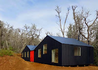Family House Design With Small Individual Sheds Within The Larger Structure