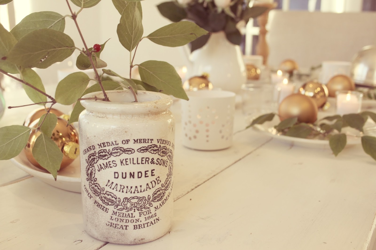 Vintage Dundee marmalade jar on romantic feminine modern farmhouse tablescape on rustic farm table