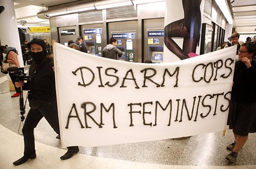 disarm+cops+arm+feminists.jpg