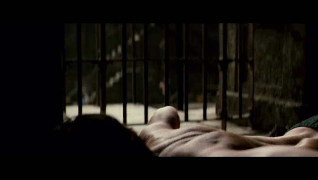 The Dark Knight Rises Bruce Wayne push ups