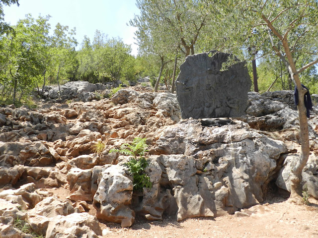 The first Stations of the Cross plaque at the base of Cross Mountain