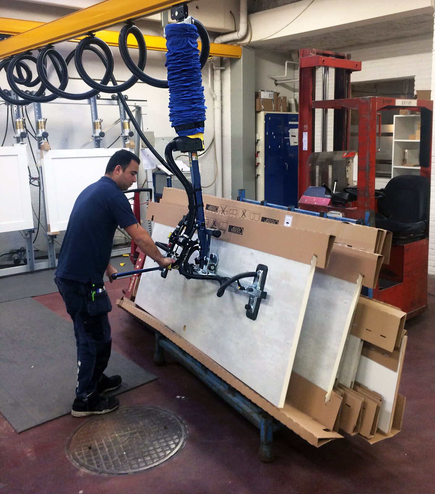 TAWIInternational Lifting and tilting door panels with VacuEasylift