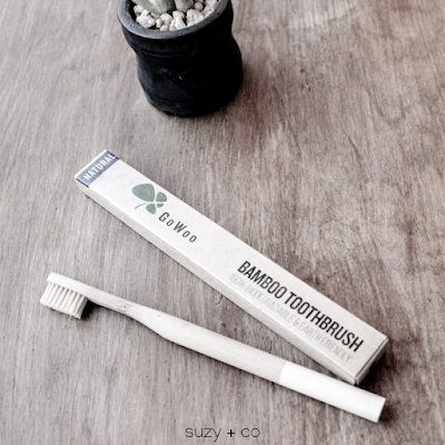 switching to a bamboo toothbrush for sustainability and for a zero waste journey. bamboo toothbrush for zero waste living