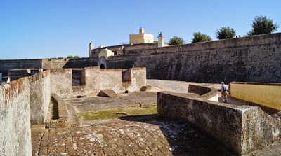 A white building is central part of Santa Luiza fortress.