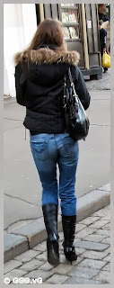 Girl in jeans on the street 