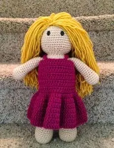 http://www.craftsy.com/pattern/crocheting/toy/crochet-doll-with-changeable-clothing/80373