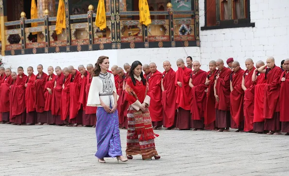 Britain's Prince William and Catherine, Duchess of Cambridge walk with King Jigme Khesar Namgyel Wangchuck and Queen Jetsun Pema
