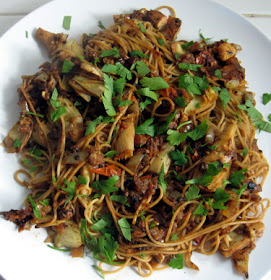 angel hair pasta with tomatoes, artichoke hearts, olives, eggplant, parsley