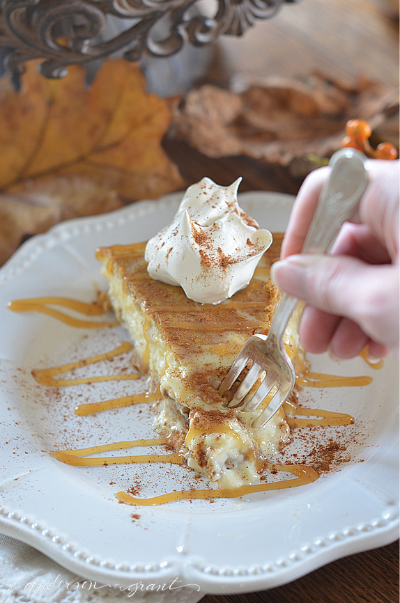 Taking a bite of pumpkin cheesecake with fork