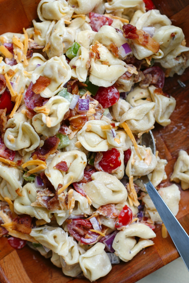 Bacon Ranch Tortellini Salad is a party perfect pasta salad that pairs cheese-filled tortellini with fresh veggies, cheddar cheese, cool ranch dressing, and lots of crisp crumbled bacon! SeeTheLight AD