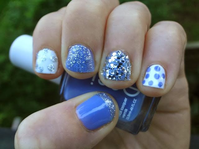 Blue polish with silver glitter, white polish with polka dots