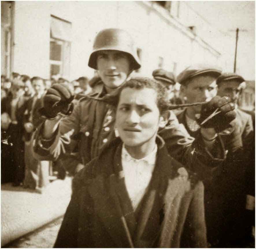 German Soldier, Mocking Jewish Prisoner.