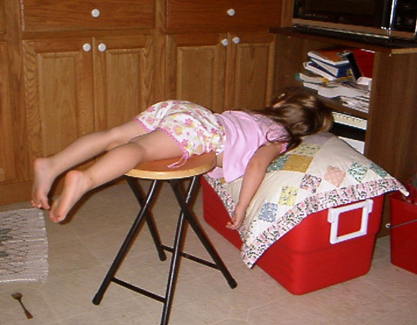 15+ Hilarious Pics That Prove Kids Can Sleep Anywhere - Napping On A Chair