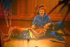 The painting depicts Hang Jebat dying in Hang Tuah's lap.