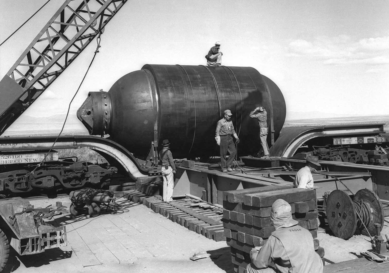 umbo, a 200-ton steel canister designed to recover the plutonium used in the Trinity test in the event that the explosives used were unable to trigger a chain reaction. In the end, Jumbo wasn't used for recovery, but was placed near ground zero to help gauge the effects of the blast. It survived intact, but its support tower did not.