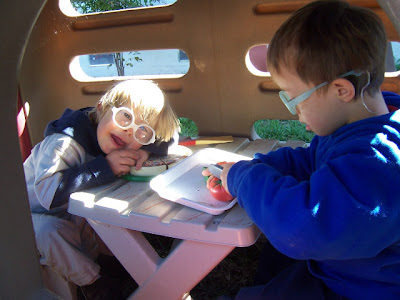 Lisa Nolan's son and his buddy sitting at a table when they were in preschool