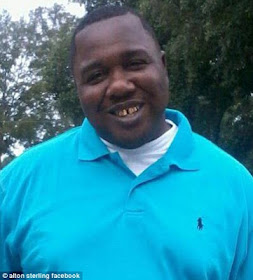 BlackLivesMatters: Image Of Alton Sterling Painted On The Wall Outside The Store Cops Fatally Shot Him (Photos)