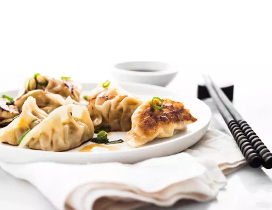 Spicy Chicken Pot Stickers Ginger Infused Sauce