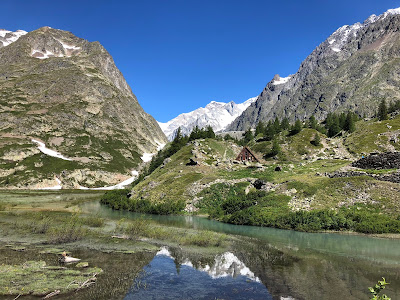 View of Cabane du Combal, with Lake Combal in front.