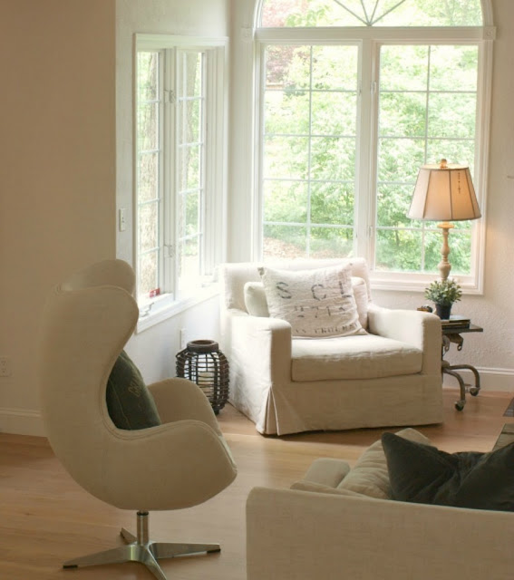 Belgian style living room with Egg chair and Belgian linen - Hello Lovely Studio