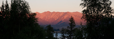 View from the tent at sunset over lake Tekapo