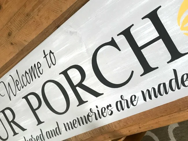 Porch sign with painted words