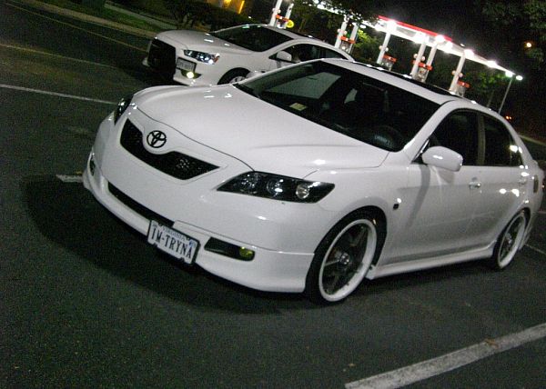 White toyota camry with black rims