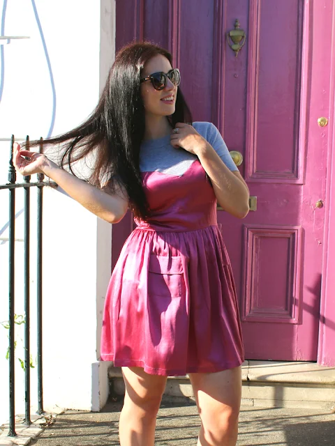 London fashion blogger Emma Louise Layla in pink satin dress in Camden