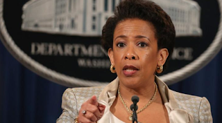 Loretta Lynch Says Baltimore Police Engaged in 'Unlawful And Unconstitutional Conduct' 