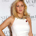 Singer Ellie Goulding At Harpers Bazaar In White Dress