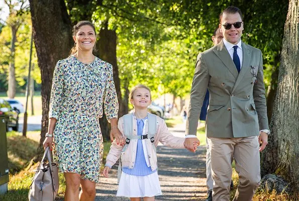Crown Princess Victoria is wearing Baum und Pferdgarten skirt and blouse. Princess Estelle on the first school day