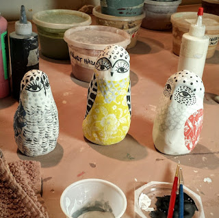 on the table today, painting little owls. Cathy Kiffney