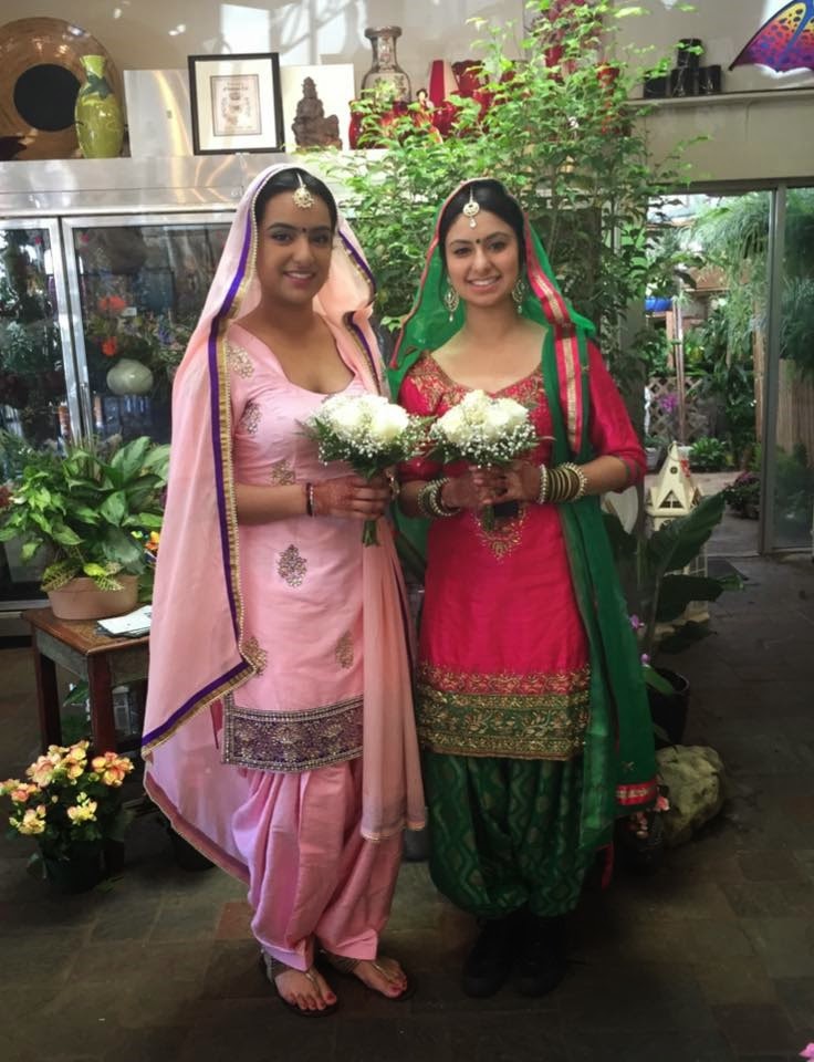 Bridesmaids of a traditional Indian Wedding with flowers by Stein Your Florist Co.