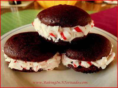 Peppermint Creme Sandwich Cookies: a chocolate devil's food cookies sandwiched with a peppermint creme center | Recipe developed by www.BakingInATornado.com | Blog With Friends: Traditions | #recipe #cookies #holiday #Christmas