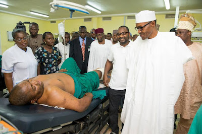 Photos: Pres. Buhari visits Abuja bomb blast victims, pays bill of girl shot by armed robbers