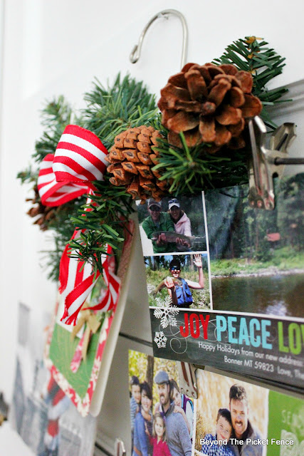 use a thrift store hanger to make a christmas card holder