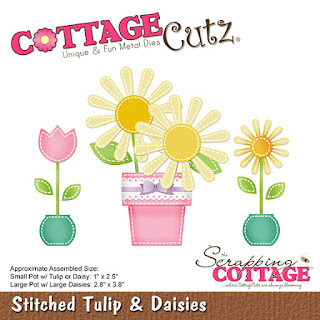 http://www.scrappingcottage.com/cottagecutzstitchedtulipanddaisies.aspx