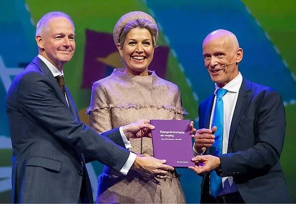 Queen Maxima wore a belted coat dress by Claes Iversen, and hat. Hans Boodt Mannequins in collaboration with Claes Iversen